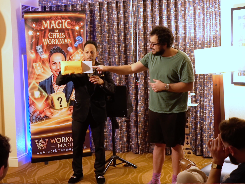 chris workman las vegas magician does magic to the groom for his bachelor party in hotel suite